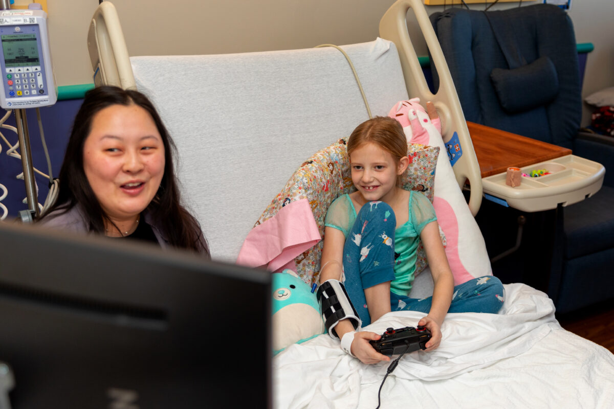 Child playing on GO Kart (Gamers Outreach Kart).
